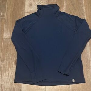 Lightweight mock turtleneck top by Stio